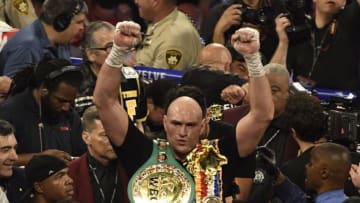 LAS VEGAS, NV - FEBRUARY 22: Tyson Fury holds his belts after going 7 rounds with Deontay Wilder at the MGM Grand Hotel February 22, 2020 in Las Vegas, Nevada. Las Vegas NV. Tyson Fury took the win by win TKO in the 7th round as the towel was thrown in from Wilder's corner for the world heavyweight championship in Las Vegas, Nevada. (Photo by MB Media/Getty Images)