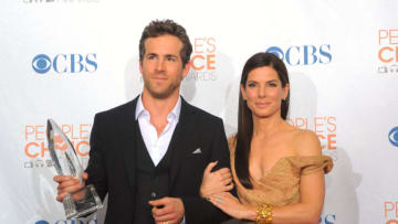 LOS ANGELES, CA - JANUARY 06: Actor Ryan Reynolds (L) and actress Sandra Bullock pose with the Favorite Comedy Movie award for 'The Proposal' in the press room during the People's Choice Awards 2010 held at Nokia Theatre L.A. Live on January 6, 2010 in Los Angeles, California. (Photo by Jason Merritt/Getty Images for PCA)