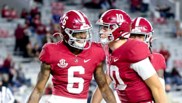 Oct 31, 2020; Tuscaloosa, Alabama, USA; Alabama wide receiver DeVonta Smith (6) and Alabama quarterback Mac Jones (10) celebrate a touchdown pass from Jones to Smith at Bryant-Denny Stadium during the second half of Alabama's 41-0 win over Mississippi State. Mandatory Credit: Gary Cosby Jr/The Tuscaloosa News via USA TODAY Sports