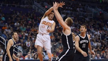 Nov 12, 2016; Phoenix, AZ, USA; Phoenix Suns guard Devin Booker (1) passes the ball against the Brooklyn Nets during the second half at Talking Stick Resort Arena. The Nets won 122-104. Mandatory Credit: Joe Camporeale-USA TODAY Sports