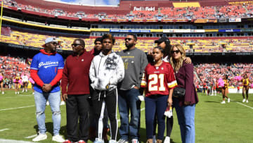Oct 17, 2021; Landover, Maryland, USA; The family former player Sean Taylor is honored before the game between the Washington Football Team and the Kansas City Chiefs during the first quarter at FedExField. Mandatory Credit: Brad Mills-USA TODAY Sports