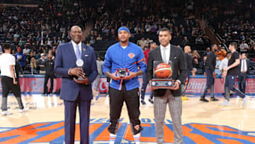 NEW YORK CITY - DECEMBER 7: Carmelo Anthony #7 of the New York Knicks receives his USAB Olympic ring and poses with Spencer Haywood and Allan Houston during a game between the Cleveland Cavaliers and the New York Knicks at Madison Square Garden in New York, New York. Copyright 2016 NBAE (Photo by Nathaniel S. Butler/NBAE via Getty Images)