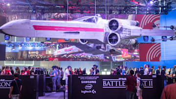 COLOGNE, GERMANY - AUGUST 22: Visitors play on a computer in the Star Wars area while visiting the Gamescom 2017 video gaming trade fair on August 22, 2017 in Cologne, Germany. Gamescom is the world's second-largest games fair and attracts over 300,000 visitors. The 2017 fair will be open to the public from August 23-26. (Photo by Lukas Schulze/Getty Images)