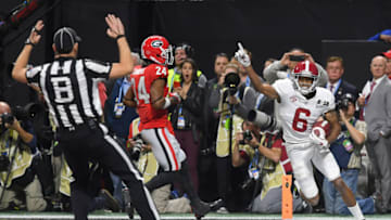 ATLANTA, GA - JANUARY 08: DeVonta Smith (6) of the Alabama Crimson Tide celebrates catching a 41 yard touchdown pass to beat the Georgia Bulldogs in the CFP National Championship presented by AT&T in overtime at Mercedes-Benz Stadium on January 8, 2018 in Atlanta, Georgia. (Photo by Robin Alam/Icon Sportswire via Getty Images)