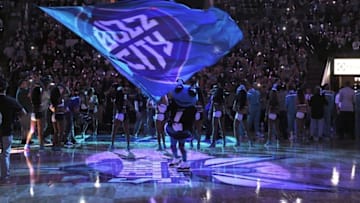 Oct 29, 2014; Charlotte, NC, USA; Charlotte Hornets mascot Hugo the Hornet waives the banner before the tipoff of the game against the Milwaukee Bucks at Time Warner Cable Arena. Mandatory Credit: Sam Sharpe-USA TODAY Sports