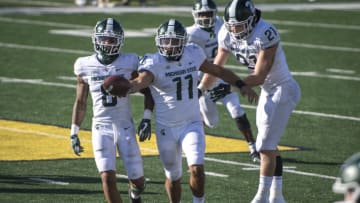 ANN ARBOR, MI - OCTOBER 31: Connor Heyward #11 of the Michigan State Spartans celebrates after receiving an onside kick during the fourth quarter against the Michigan Wolverines at Michigan Stadium on October 31, 2020 in Ann Arbor, Michigan. (Photo by Nic Antaya/Getty Images)