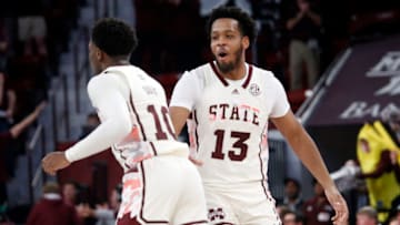 Feb 25, 2023; Starkville, Mississippi, USA; Mississippi State Bulldogs forward Will McNair Jr. (13) reacts with guard Dashawn Davis (10) during the second half against the Texas A&M Aggies at Humphrey Coliseum. Mandatory Credit: Petre Thomas-USA TODAY Sports