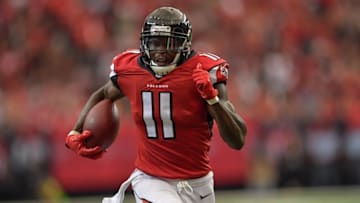 Sep 11, 2016; Atlanta, GA, USA; Atlanta Falcons wide receiver Julio Jones (11) carries the ball to score a touchdown against the Tampa Bay Buccaneers during the second half at the Georgia Dome. The Buccaneers won 31-24. Mandatory Credit: Dale Zanine-USA TODAY Sports