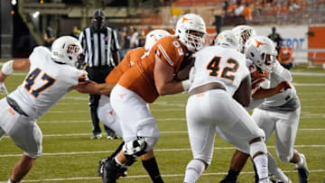 Sep 12, 2020; Austin, Texas, USA; Texas Longhorns offensive lineman Andrej Karic (69) blocks Texas El Paso Miners defensive back Deylon Williams (42) in the second half at Darrell K Royal-Texas Memorial Stadium. Mandatory Credit: Scott Wachter-USA TODAY Sports