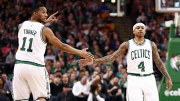 Feb 29, 2016; Boston, MA, USA; Boston Celtics guard Evan Turner (11) and guard Isaiah Thomas (4) celebrate against the Utah Jazz during the first half at TD Garden. Mandatory Credit: Mark L. Baer-USA TODAY Sports