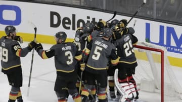 LAS VEGAS, NV - DECEMBER 23: Vegas Golden Knights players celebrate after winning a regular season game against the Washington Capitals at T-Mobile Arena on Saturday, Dec. 23, 2017, in Las Vegas. The Vegas Golden Knights would defeat the Washington Capitals 3-0. (Photo by: Marc Sanchez/Icon Sportswire via Getty Images)
