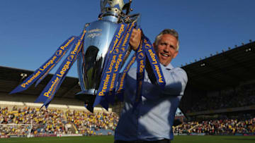 OXFORD, ENGLAND - JULY 19: Gary Lineker poses for a picture with the Premier League Trophy prior to the pre-season friendly between Oxford City and Leicester City at Kassam Stadium on July 19, 2016 in Oxford, England. (Photo by Steve Bardens/Getty Images)
