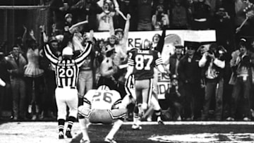 Wide receiver Dwight Clark of the San Francisco 49ers leaves a Dallas defender in his dust after making 'The Catch' to defeat the Dallas Cowboys 28-27 in the 1981 NFC Championship Game on January 10, 1982 at Candlestick Park in San Francisco, California. (Photo by Arthur Anderson/Getty Images) *** Local Caption ***