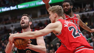 CHICAGO, ILLINOIS - MARCH 10: Kevin Love #0 of the Cleveland Cavaliers tries to get off a shot under pressure from Lauri Markkanen #24 of the Chicago Bulls at the United Center on March 10, 2020 in Chicago, Illinois. NOTE TO USER: User expressly acknowledges and agrees that, by downloading and or using this photograph, User is consenting to the terms and conditions of the Getty Images License Agreement. (Photo by Jonathan Daniel/Getty Images)
