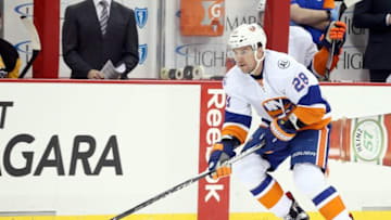Jan 2, 2016; Pittsburgh, PA, USA; against New York Islanders defenseman Marek Zidlicky (28) skates with the puck against the Pittsburgh Penguins during the first period at the CONSOL Energy Center. Mandatory Credit: Charles LeClaire-USA TODAY Sports