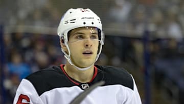COLUMBUS, OH - DECEMBER 05: New Jersey Devils defenseman Steven Santini (16) looks on during a game between the Columbus Blue Jackets and the New Jersey Devils on December 05, 2017 at Nationwide Arena in Columbus, OH. (Photo by Adam Lacy/Icon Sportswire via Getty Images)
