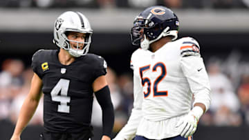 LAS VEGAS, NEVADA - OCTOBER 10: Derek Carr #4 of the Las Vegas Raiders and Khalil Mack #52 of the Chicago Bears react during the first half at Allegiant Stadium on October 10, 2021 in Las Vegas, Nevada. (Photo by Chris Unger/Getty Images)