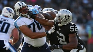 Aug 27, 2016; Oakland, CA, USA; Oakland Raiders defensive end Khalil Mack (52) attempts to rush past Tennessee Titans offensive tackle Jack Conklin (78) in the second quarter at Oakland Alameda Coliseum. Mandatory Credit: Cary Edmondson-USA TODAY Sports