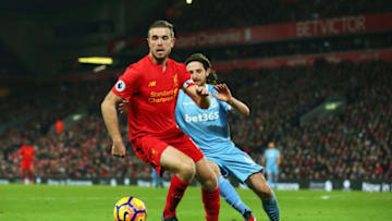 LIVERPOOL, ENGLAND - DECEMBER 27: Jordan Henderson of Liverpool holds off Joe Allen of Stoke City during the Premier League match between Liverpool and Stoke City at Anfield on December 27, 2016 in Liverpool, England. (Photo by Alex Livesey/Getty Images)