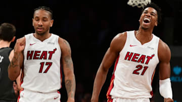 NEW YORK, NY - NOVEMBER 14: Rodney McGruder #17 and Hassan Whiteside #21 of the Miami Heat react after the Heat score in the final moments of the fourth quarter during the game against Brooklyn Nets at Barclays Center on November 14, 2018 in the Brooklyn borough of New York City. The Heat won 120-107. (Photo by Sarah Stier/Getty Images)
