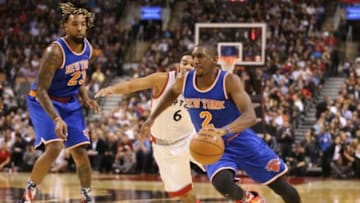 Nov 10, 2015; Toronto, Ontario, CAN; New York Knicks guard Langston Galloway (2) drives to the basket as Toronto Raptors point guard Cory Joseph (6) attempts to play defense at Air Canada Centre. The Knicks beat the Raptors 111-109. Mandatory Credit: Tom Szczerbowski-USA TODAY Sports