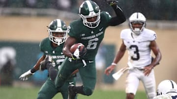 EAST LANSING, MI - NOVEMBER 04: David Dowell #6 of the Michigan State Spartans runs back a second half interception in front of DeAndre Thompkins #3 of the Penn State Nittany Lions at Spartan Stadium on November 4, 2017 in East Lansing, Michigan. (Photo by Gregory Shamus/Getty Images)