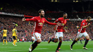 MANCHESTER, ENGLAND - NOVEMBER 19: Juan Mata of Manchester United (L) celebrates scoring his sides first goal during the Premier League match between Manchester United and Arsenal at Old Trafford on November 19, 2016 in Manchester, England. (Photo by Shaun Botterill/Getty Images)