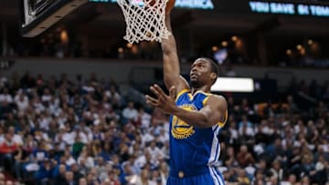 Mar 21, 2016; Minneapolis, MN, USA; Golden State Warriors forward Harrison Barnes (40) dunks in the first quarter against the Minnesota Timberwolves at Target Center. Mandatory Credit: Brad Rempel-USA TODAY Sports