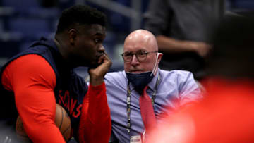 Zion Williamson #1 of the New Orleans Pelicans speaks with David Griffin (Photo by Sean Gardner/Getty Images)