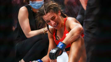 SINGAPORE, SINGAPORE - JUNE 12: Joanna Jedrzejcyk of Polandreacts to losing to Zhang Weili of China during their Women's Strawweight Fight at Singapore Indoor Stadium on June 12, 2022 in Singapore. (Photo by Yong Teck Lim/Getty Images)