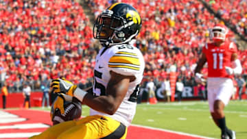 Sep 24, 2016; Piscataway, NJ, USA; Iowa Hawkeyes running back Akrum Wadley (25) runs for a touchdown during the second half at High Points Solutions Stadium. Iowa defeated Rutgers 14-7. Mandatory Credit: Ed Mulholland-USA TODAY Sports