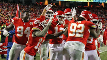 Dec 25, 2016; Kansas City, MO, USA; Kansas City Chiefs players congratulate nose tackle Dontari Poe (92) after he threw a touchdown pass during the second half at Arrowhead Stadium. The Chiefs won 33-10. Mandatory Credit: Jay Biggerstaff-USA TODAY Sports