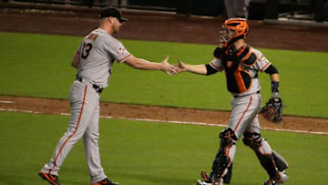 PHOENIX, AZ - JUNE 29: Relief pitcher Will Smith #13 of the San Francisco Giants celebrates with catcher Buster Posey #28 after defeating the Arizona Diamondbacks 2-1 in the MLB game at Chase Field on June 29, 2018 in Phoenix, Arizona. (Photo by Christian Petersen/Getty Images)