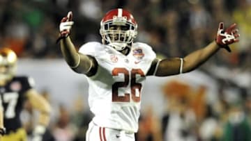 Jan 7, 2013; Miami, FL, USA; Alabama Crimson Tide defensive back Landon Collins (26) motions to the fans during the first half of the 2013 BCS Championship game against the Notre Dame Fighting Irish at Sun Life Stadium. Mandatory Credit: Eileen Blass-USA TODAY Sports