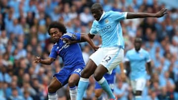 MANCHESTER, ENGLAND - AUGUST 16: Yaya Toure of Manchester City holds off Willian of Chelsea during the Barclays Premier League match between Manchester City and Chelsea at Etihad Stadium on August 16, 2015 in Manchester, United Kingdom. (Photo by Alex Livesey/Getty Images)