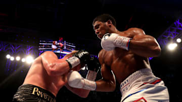 LONDON, ENGLAND - SEPTEMBER 22: Anthony Joshua punches Alexander Povetkin during the IBF, WBA Super, WBO & IBO World Heavyweight Championship title fight between Anthony Joshua and Alexander Povetkin at Wembley Stadium on September 22, 2018 in London, England. (Photo by Richard Heathcote/Getty Images)