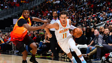 ATLANTA, GA - DECEMBER 19: Trae Young #11 of the Atlanta Hawks handles the ball against the Utah Jazz on December 19, 2019 at State Farm Arena in Atlanta, Georgia. NOTE TO USER: User expressly acknowledges and agrees that, by downloading and/or using this Photograph, user is consenting to the terms and conditions of the Getty Images License Agreement. Mandatory Copyright Notice: Copyright 2019 NBAE (Photo by Scott Cunningham/NBAE via Getty Images)