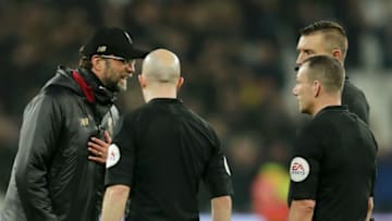 LONDON, ENGLAND - FEBRUARY 04: Jurgen Klopp, Manager of Liverpool speaks to referee Kevin Friend and assistant referees Matthew Wilkes and Simon Beck following the the Premier League match between West Ham United and Liverpool FC at London Stadium on February 04, 2019 in London, United Kingdom. (Photo by Richard Heathcote/Getty Images)