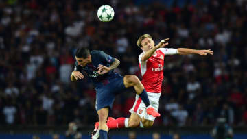 Paris Saint-Germain's Argentinian midfielder Angel Di Maria (L) vies with Arsenal's Spanish defender Nacho Monreal during the UEFA Champions League Group A football match between Paris-Saint-Germain vs Arsenal FC, on September 13, 2016 at the Parc des Princes stadium in Paris. AFP PHOTO / FRANCK FIFE / AFP / FRANCK FIFE (Photo credit should read FRANCK FIFE/AFP/Getty Images)