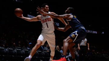 DENVER, CO - NOVEMBER 24: Devin Booker #1 of the Phoenix Suns handles the ball against the Denver Nuggets on November 24, 2019 at the Pepsi Center in Denver, Colorado. NOTE TO USER: User expressly acknowledges and agrees that, by downloading and/or using this Photograph, user is consenting to the terms and conditions of the Getty Images License Agreement. Mandatory Copyright Notice: Copyright 2019 NBAE (Photo by Bart Young/NBAE via Getty Images)