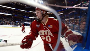 Apr 7, 2016; Tampa, FL, USA; Denver Pioneers forward Danton Heinen (20) skates on during the third period at the semifinals of the 2016 Frozen Four college ice hockey tournament against the North Dakota Fighting Hawks at Amalie Arena. North Dakota Fighting Hawks defeated the Denver Pioneers 4-2. Mandatory Credit: Kim Klement-USA TODAY Sports