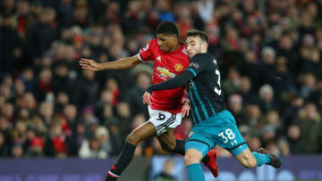 MANCHESTER, ENGLAND - DECEMBER 30: Marcus Rashford of Manchester United is tackled by Sam McQueen of Southampton during the Premier League match between Manchester United and Southampton at Old Trafford on December 30, 2017 in Manchester, England. (Photo by Alex Livesey/Getty Images)