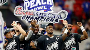 ATLANTA, GEORGIA - DECEMBER 29: The Florida Gators celebrate their teams win over the Michigan Wolverines during the Chick-fil-A Peach Bowl at Mercedes-Benz Stadium on December 29, 2018 in Atlanta, Georgia. The Gators defeated the Wolverines 41-15. (Photo by Joe Robbins/Getty Images)