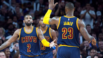 Apr 22, 2016; Auburn Hills, MI, USA; Cleveland Cavaliers guard Kyrie Irving (2) high fives forward LeBron James (23) during the third quarter against the Detroit Pistons in game three of the first round of the NBA Playoffs at The Palace of Auburn Hills. Mandatory Credit: Tim Fuller-USA TODAY Sports