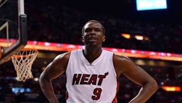 Apr 10, 2016; Miami, FL, USA; Miami Heat forward Luol Deng (9) reacts after drawing a foul during the first half against the Orlando Magic at American Airlines Arena. Mandatory Credit: Steve Mitchell-USA TODAY Sports