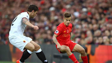 LIVERPOOL, ENGLAND - NOVEMBER 06: Daryl Janmaat of Watford chases Philippe Coutinho of Liverpool during the Premier League match between Liverpool and Watford at Anfield on November 6, 2016 in Liverpool, England. (Photo by Clive Brunskill/Getty Images)