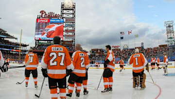 PHILADELPHIA, PA - DECEMBER 31: The Philadelphia Flyers warm up before playing against the New York Rangers during the 2012 Bridgestone NHL Winter Classic Alumni Game on December 31, 2011 at Citizens Bank Park in Philadelphia, Pennsylvania. (Photo by Jim McIsaac/Getty Images)