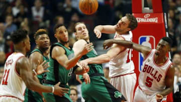Jan 7, 2016; Chicago, IL, USA; Chicago Bulls center Pau Gasol (16) passes the ball to guard Jimmy Butler (21) against the Boston Celtics during the second half at United Center. The Bulls won 101-92. Mandatory Credit: Kamil Krzaczynski-USA TODAY Sports