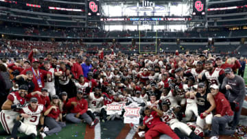ARLINGTON, TEXAS - DECEMBER 01: The Oklahoma Sooners celebrate a 39-27 Big 12 Championship win against the Texas Longhorns at AT&T Stadium on December 01, 2018 in Arlington, Texas. (Photo by Ronald Martinez/Getty Images)