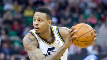 Jan 10, 2014; Salt Lake City, UT, USA; Utah Jazz shooting guard Brandon Rush (25) controls the ball during the second half against the Cleveland Cavaliers at EnergySolutions Arena. The Cavaliers won 113-102. Mandatory Credit: Russ Isabella-USA TODAY Sports